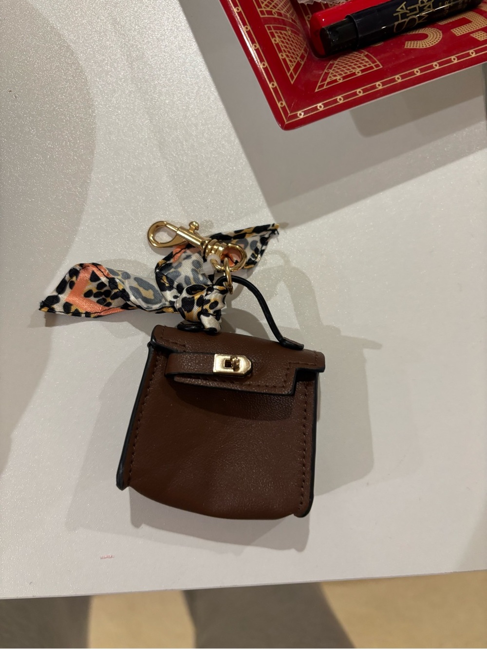 Macy's Brown Mini Leather Bag Charm with Printed Scarf Accent
